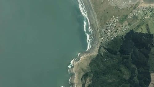 Live Port Waikato surf cam showing spot conditions.