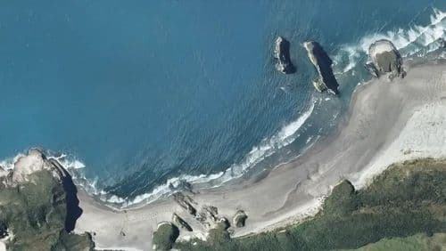 Live Wharariki Beach surf cam showing spot conditions.